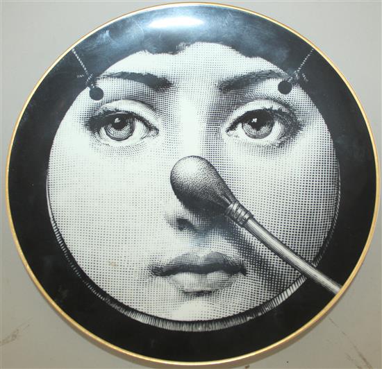 A collection of Fornasetti Temi e Variazioni and musical trophy pattern items,